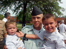 Pvt. Ward holding his boys